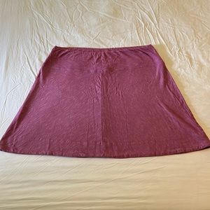 Muted pink, raspberry colored skirt